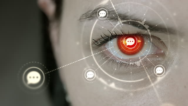 Young-cyborg-female-blinks-then-chat-symbols-appears.