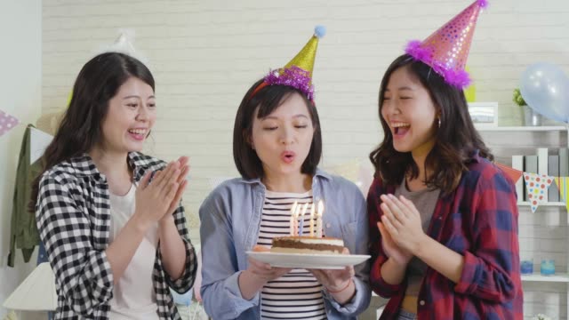 women-clapping-hands-celebrating-birthday-party