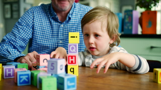 Father-And-son-Playing-With-Wooden-Blocks
