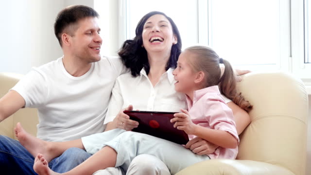 Family-using-digital-tablet