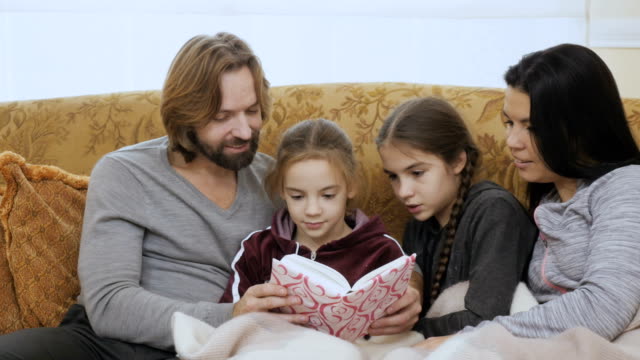 Family-reads-the-book-together