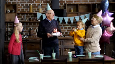 Grandparents-singing-happy-birthday-to-grandson
