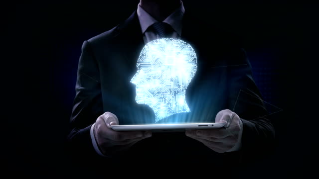 Businessman-lifting-tablet,-CPU-chip-circuit-board-connected-human-head-shape,-4K-movie.grow-artificial-intelligence.-2.