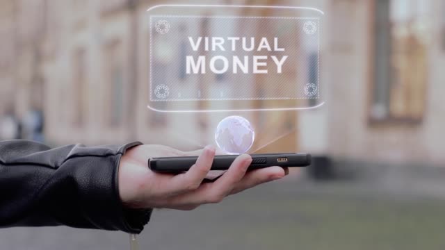 Männliche-Hände-zeigen-auf-Smartphone-konzeptionelle-HUD-Hologramm-virtuellen-Geld