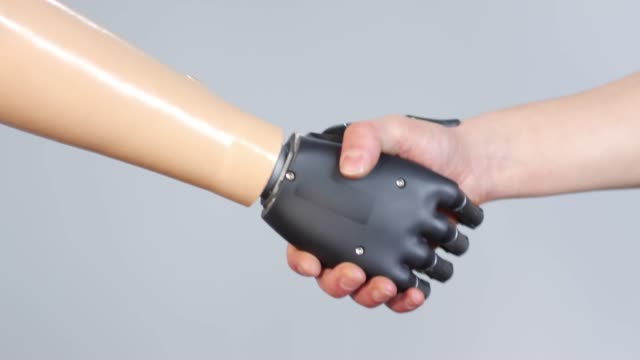 Person-with-Prosthetic-Arm-Shaking-Hands-with-Someone