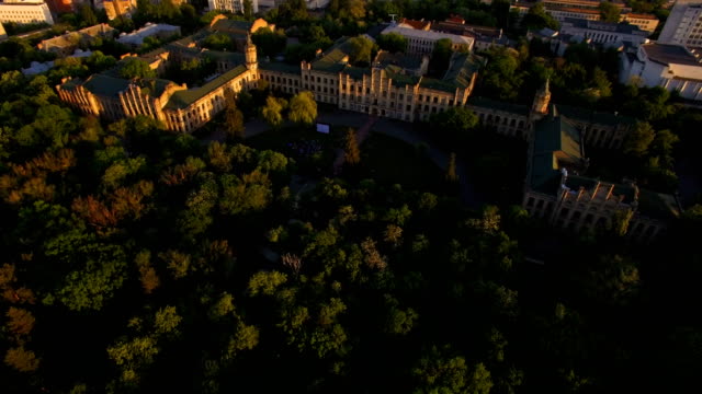 The-old-university-building-on-the-background-of-the-city-at-sunset