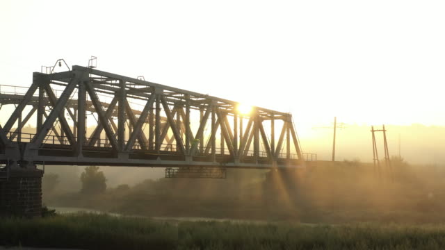 Iron-railway-bridge-at-dawn-in-the-fog