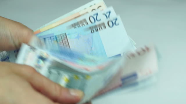 Women-with-euro-banknotes