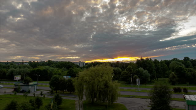 Time-lapse-sunrise-in-the-city-Lviv,-Ukraine.-Overcast-weather-and-clouds-are-moving-quickly-in-the-sky.