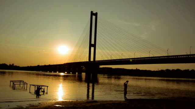 River-and-bridge.Most-at-sunset