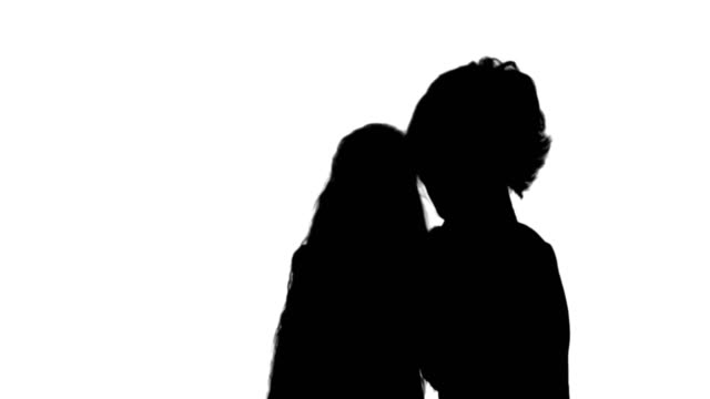 Silhouette-Cute-family-mother-with-child-daughter-taking-selfie-smart-phone-photo-track-matte