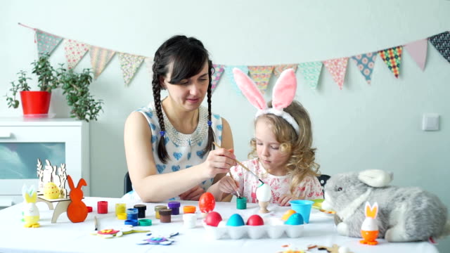 Mother-and-Child-Painting-Easter-Egg-Together