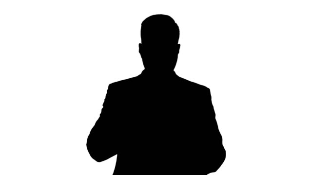 Silhouette-Young-businessman-looking-at-tablet-and-thinking