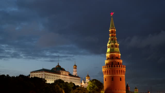 Tower-of-the-Moscow-Kremlin-against-the-background-of-moving-clouds-at-night