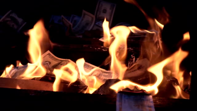 burning-one-hundred-dollar-bill-slow-motion