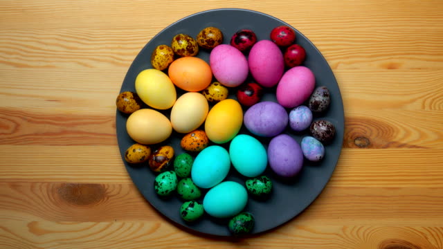 Festive-easter-eggs-laid-on-a-gray-plate