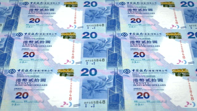 Banknotes-of-twenty-dollars-of-Hong-Kong-rolling,-cash-money,-loop