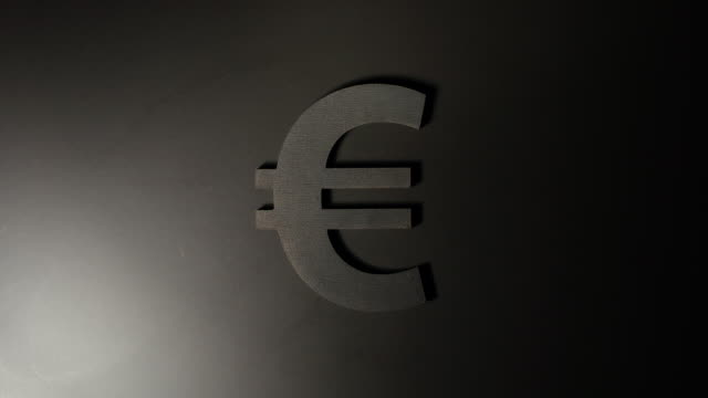 Euro-Symbol-leuchtet-Licht-bewegen