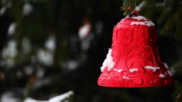 new-year-red-bell-natural-street-fir-tree-winter-snow-Moscow-city-hd-footage