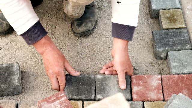Laying-Paving-Slabs-By-Mosaic-Close-Up.-Road-Paving,-Construction.