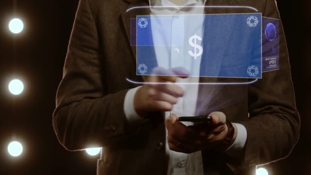 Businessman-uses-hologram-with-text-Sign-USD