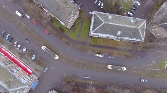 flying-over-the-roofs-of-houses-over-the-road