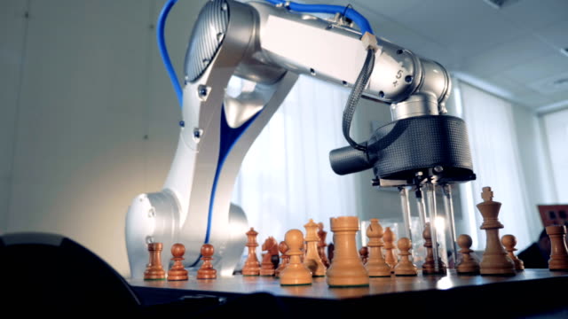 Artificial-intelligence,-machine-intelligence-concept.-Innovative-robot-playing-chess.