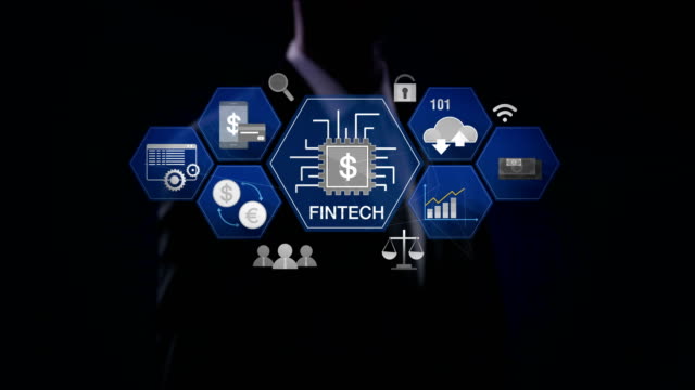 Businessman-touching-Fin-tech-icon-and-various-graph.-Futuristic-financial-technology.-4k-movie.-version-3.