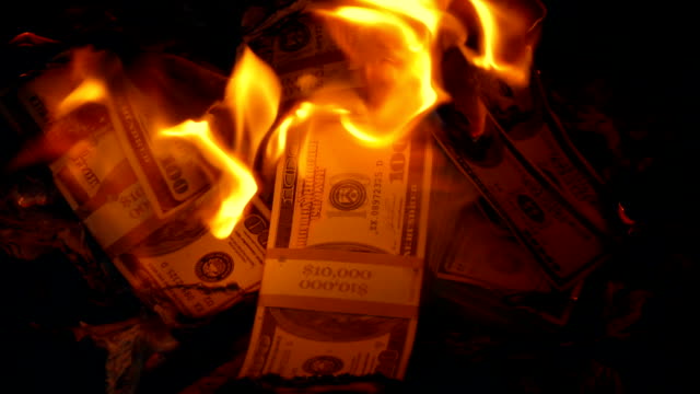 Pile-Of-Dollars-On-Fire