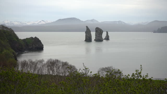 Rocky-islands-in-Pacific-Ocean-on-shores-of-Kamchatka-Peninsula