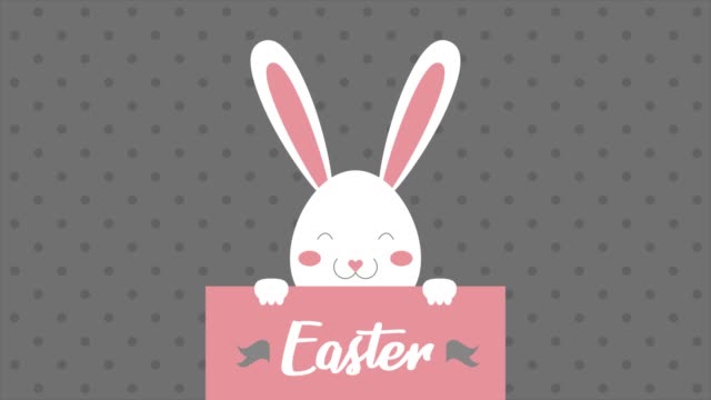 Easter-text,-animated-footage-in-4K.-Close-up-text-and-rabbit-on-gray-background.