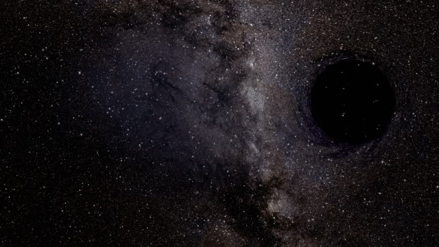 The-light-of-background-stars-is-distorted-as-a-black-hole-passes-in-front-of-them.
