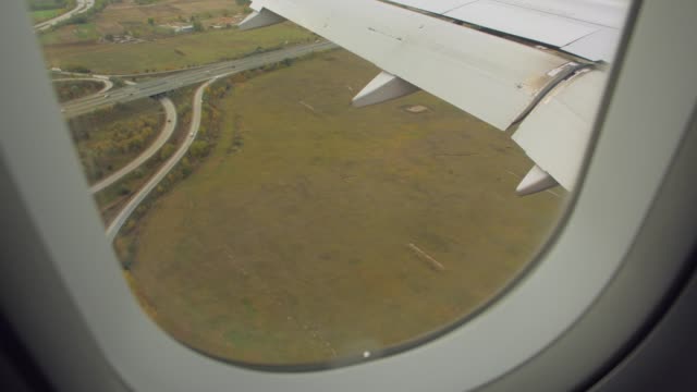 Cars-Road-Junction-From-Airplane