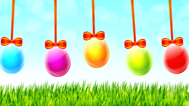 Colorful-Easter-eggs-on-green-grass-background