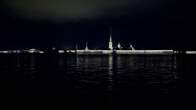 illuminated-Peter-and-Paul-Fortress-in-Saint-Petersburg-in-night,-city-panorama