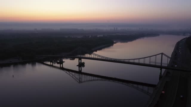 Day-time-over-the-Dnieper-river-in-Kiev.-Beautiful-dawn-over-the-Postal-square-in-Kiev.-Video-of-Kiev-on-the-Dnieper-river.-Sun-ray.-Aerial-photography-of-early-Kiev
