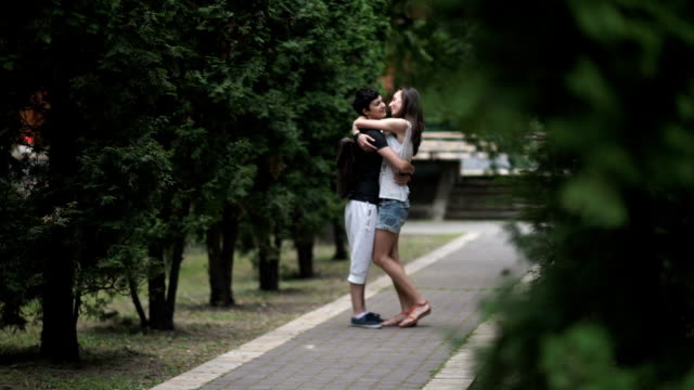 Two-lesbians-kisses-in-the-park