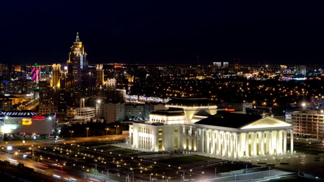 State-opera-and-ballet-theatre-with-residential-building-timelapse.-Astana,-Kazakhstan