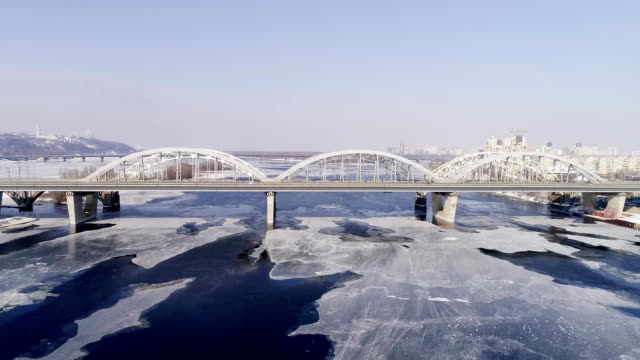 Aerial-view-of-the-Kiev-city,-Ukraine.-Dnieper-river-with-bridges.-Darnitskiy-bridge