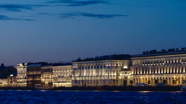 Illuminated-historic-buildings-on-an-embankment-of-the-Neva-river-in-the-White-Nights