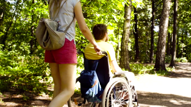 Young-disable-man-in-the-park-with-his-wife