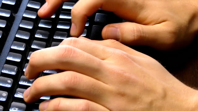 Close-Up-of-a-Typist-Typing