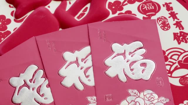 Chinesische-neue-Jahr-rote-Umschläge,-Pakete-oder-Hong-Bao,-Segen-Text-was-bedeutet-Glück-und-Erfolg