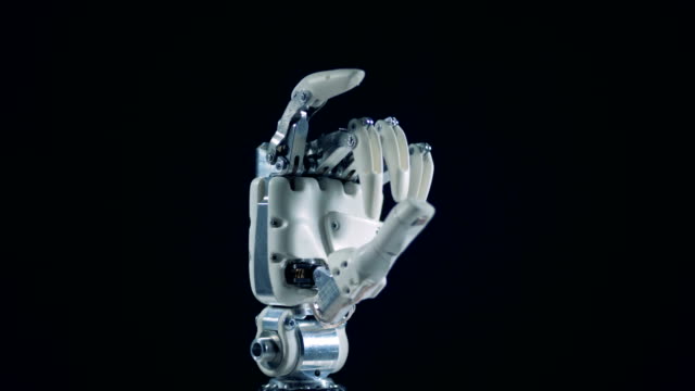 Fist-of-a-robotic-hand-is-moving-its-fingers