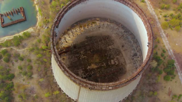 Drone-flies-over-the-cooling-tower,-Chernobyl-NPP