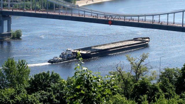 Barge-floats-on-the-Dnipro-river-in-Kyiv