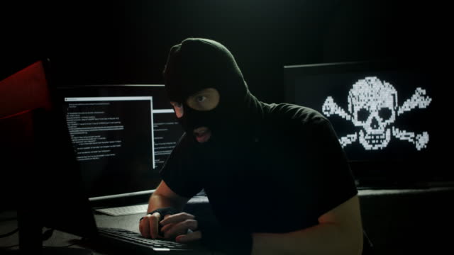 Hacker-in-T-Shirt-Stealing-Data