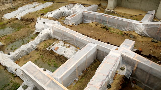 Archeological-excavations-covered-with-plastic-sheets,-ruins-protection,-history