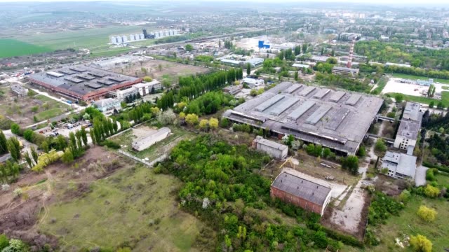 Aerial-view-from-the-air-to-an-abandoned-factory.-Abandoned-building-exterior.