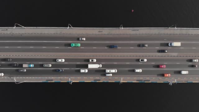 Bridge-highway-cars-traffic-aerial-top-view-tracking-shot